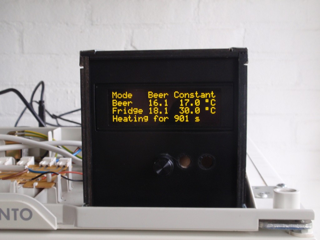 My BrewPi has a nice 4x20 character OLED display. Very bright and clear. The settings can be changed on the fridge itself with a rotary encoder with push button